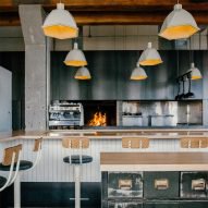 Narrow Lebanese snack bar in Montreal features array of ash furniture