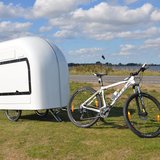 You Can Pull This Tiny Mobile Home Behind Your Bike (and Then Make a Quick Break)