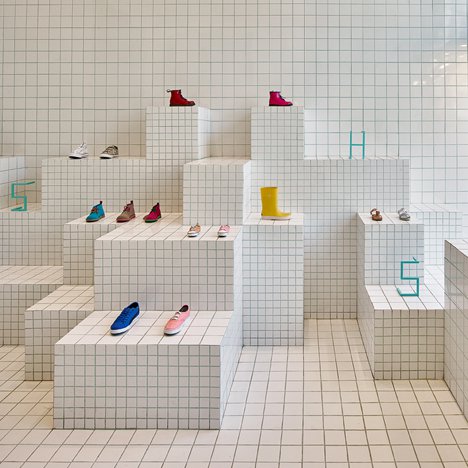 Arched doorways and bold hues feature inside Little Stories shoe store