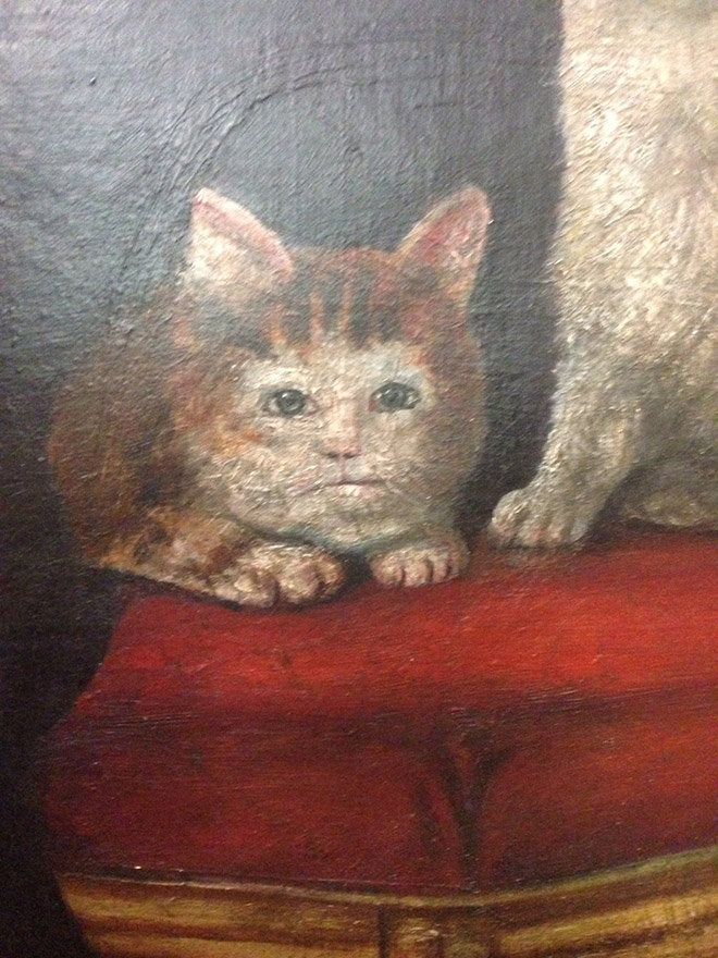 Check out Ugly Medieval Paintings of Cats, it looks like the medieval painters never laid eyes on a cat.