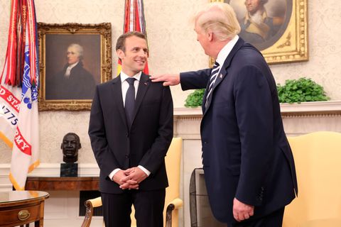 I Can’t Stop Staring at This Photo of Trump Walking Macron Like a Puppy / Elle.com