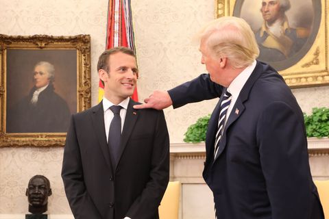 I Can’t Stop Staring at This Photo of Trump Walking Macron Like a Puppy / Elle.com