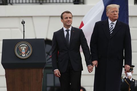 I Can’t Stop Staring at This Photo of Trump Walking Macron Like a Puppy / Elle.com