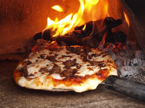 Pizza Just Tastes Really Damn Good When It Comes Out Of a Wood-Fired Brick Oven – Proved