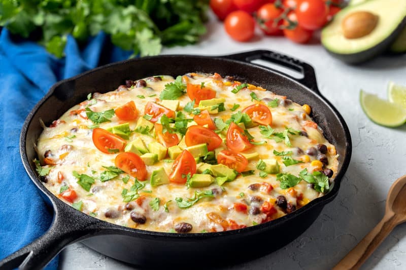 Your next Taco Tuesday recipe is here! Warm, bubbly Mexican Skillet packs in veggies and beans for a complete, vegetarian, one-pan meal. If you choose gluten-free enchilada sauce, you'll also make this meal naturally gluten free. Easy Bubbly Mexican Skillet Enchiladas Recipe For You and Your Kids!