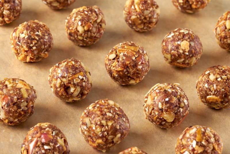 Sweet Apple Cinnamon Energy balls are delightfully chewy and crispy, packed with fruit and nuts, and free from added sugars. Keep a batch in your fridge for a healthy snack or dessert.  Healthy Apple Cinnamon Energy Balls Recipe for You and Your Kids