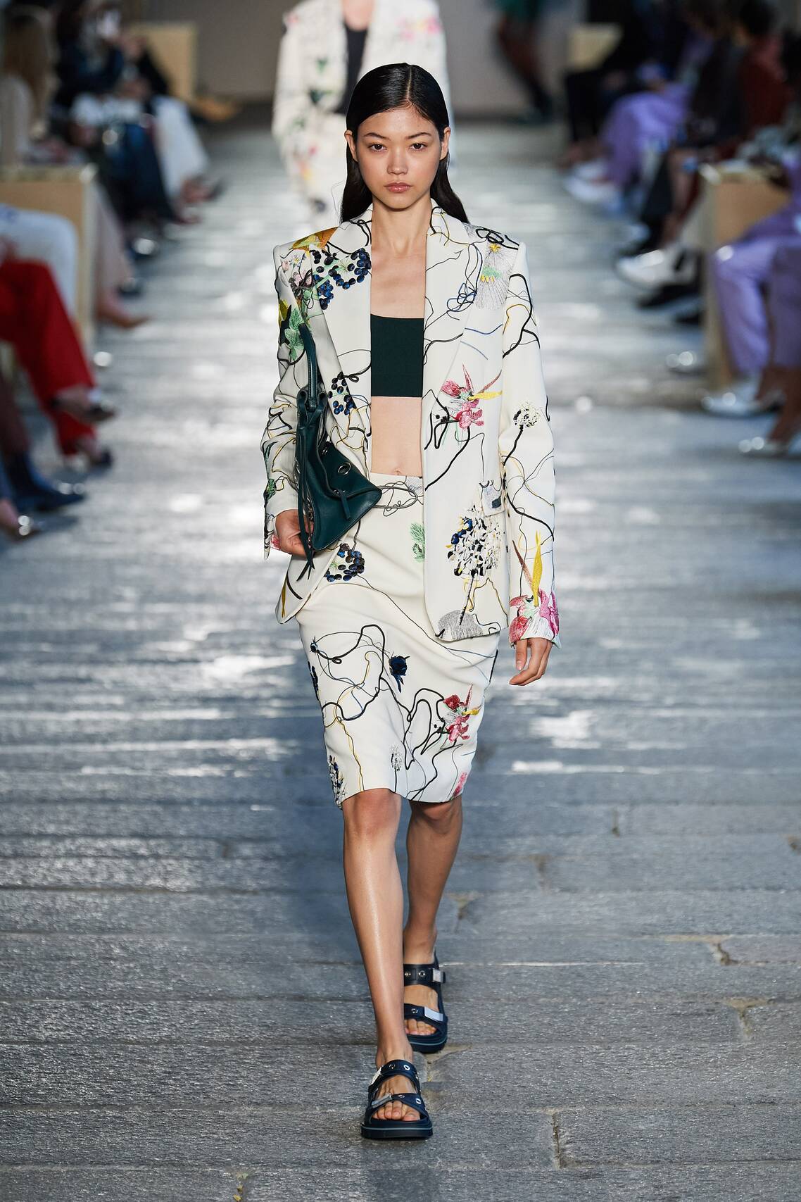 Gorgeous Floral print, eyelets and Irina Shayk among models at the Boss Spring 2021 show.